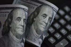 Quanto você paga de imposto de renda sobre um salário de $ 100.000?