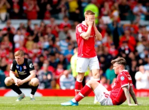 O sonho do Wrexham na Premier League está em espera, mas a sua base de fãs global pode continuar sonhando