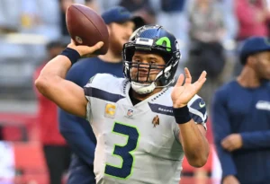 Russell Wilson lança vídeo de futebol ‘Thank You’ enquanto assume um papel na TV